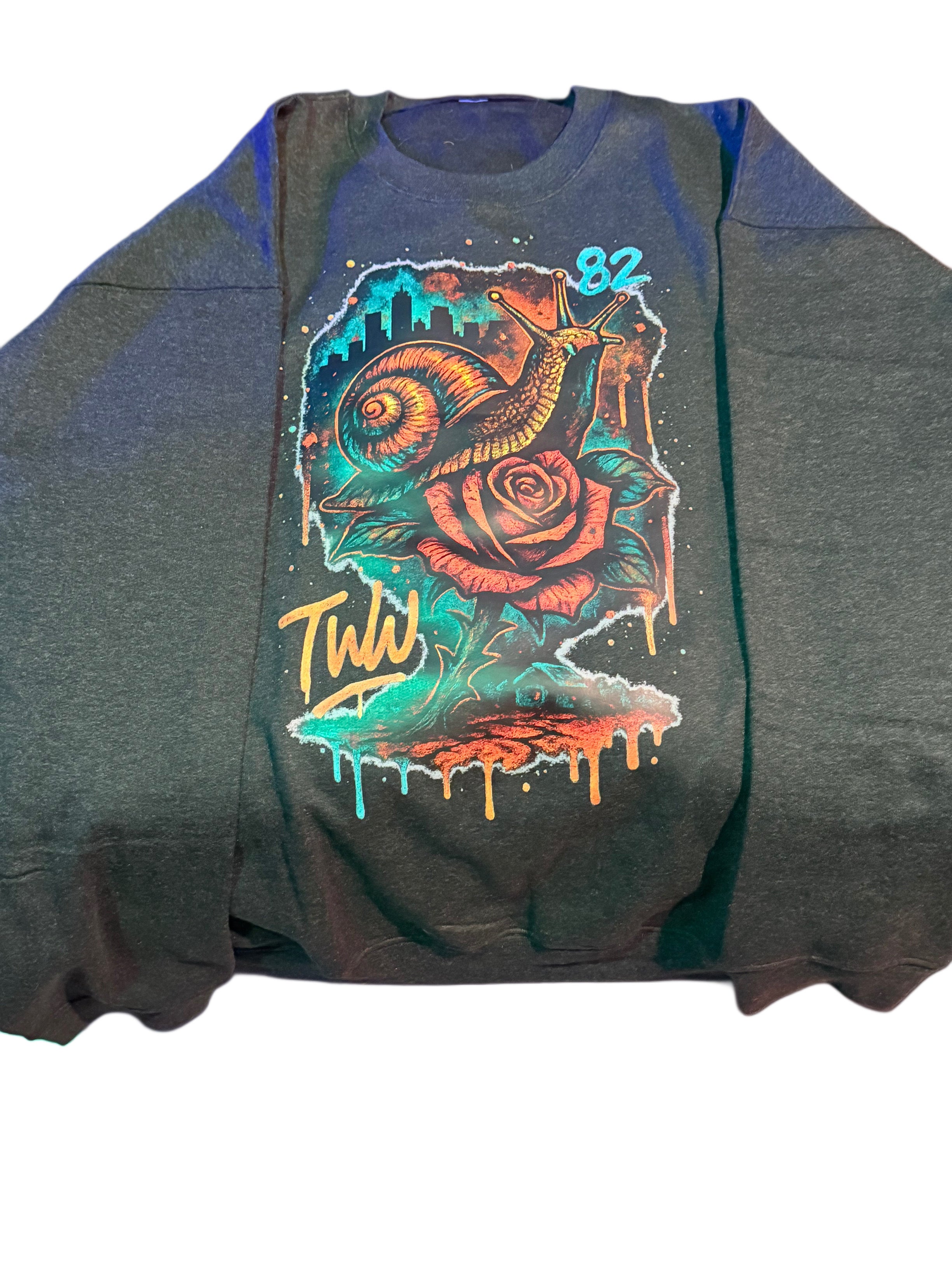 Gray sweatshirt with a colorful graphic design on a white background