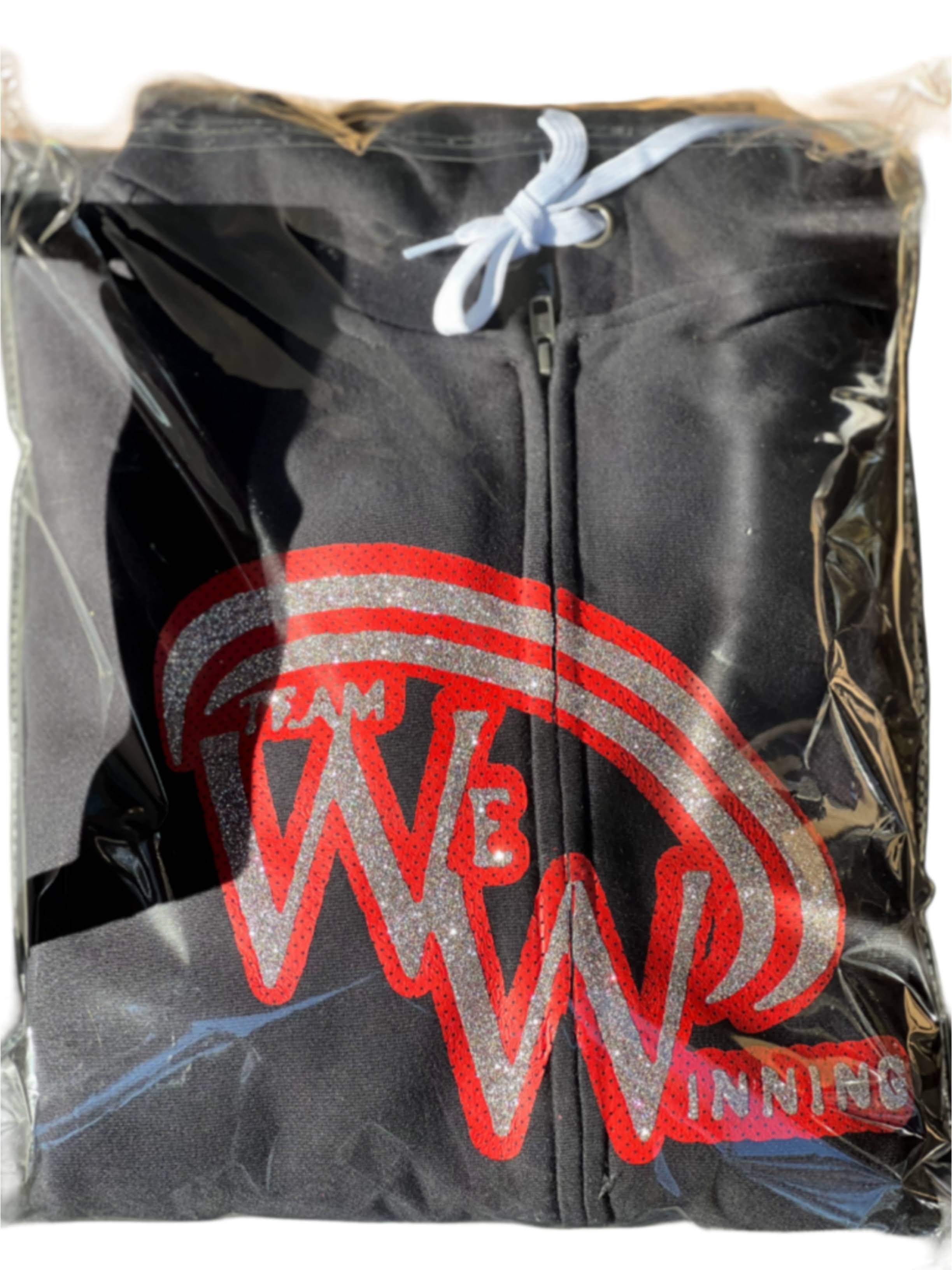 Black Team We Winning hoodie with red and white logo packaged in clear plastic