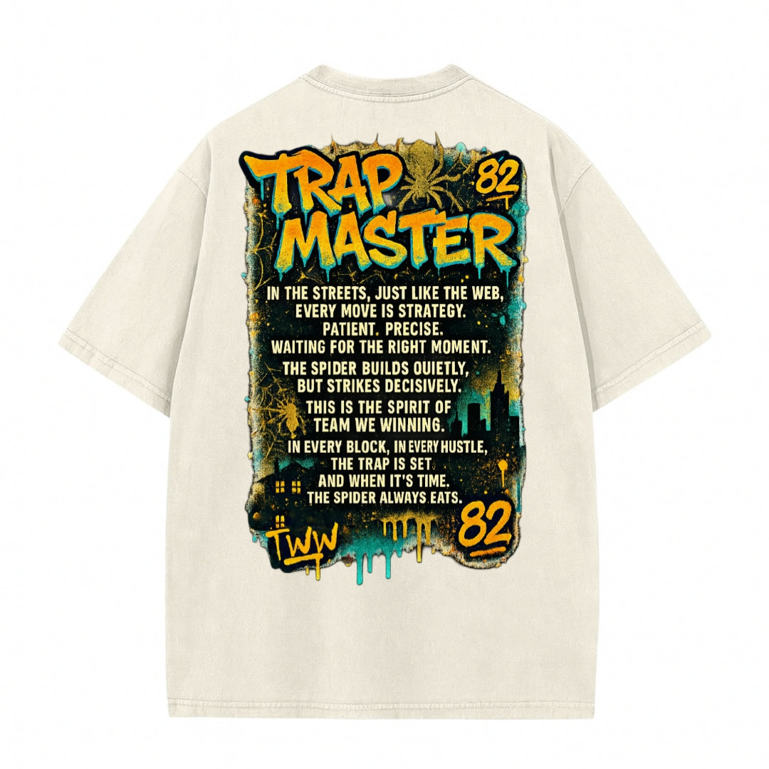 Beige T-shirt back with large yellow 'Trap Master' graphic and text design on white background